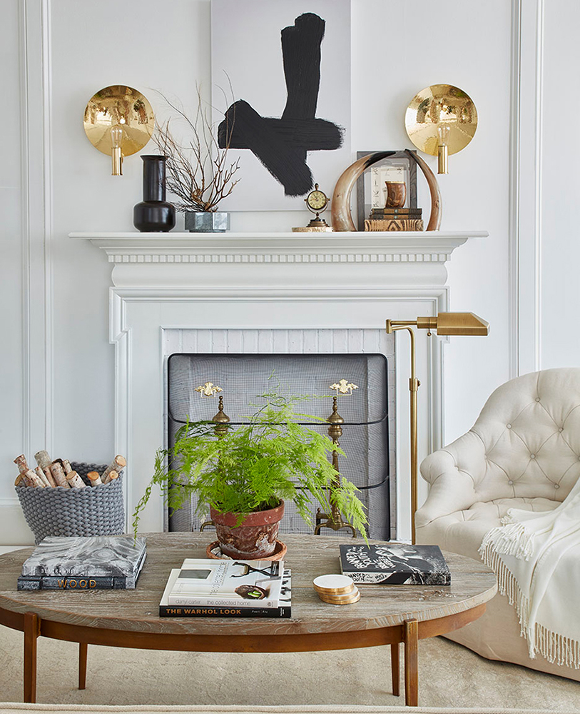 Living room set with faux fireplace in neutral tones