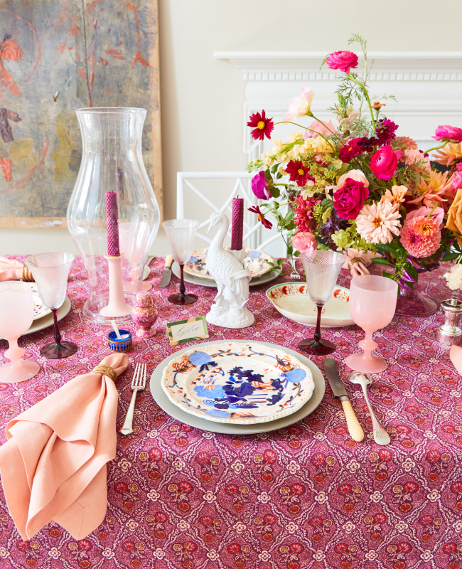 Table setting for Thanksgiving with plum and cranberry hues
